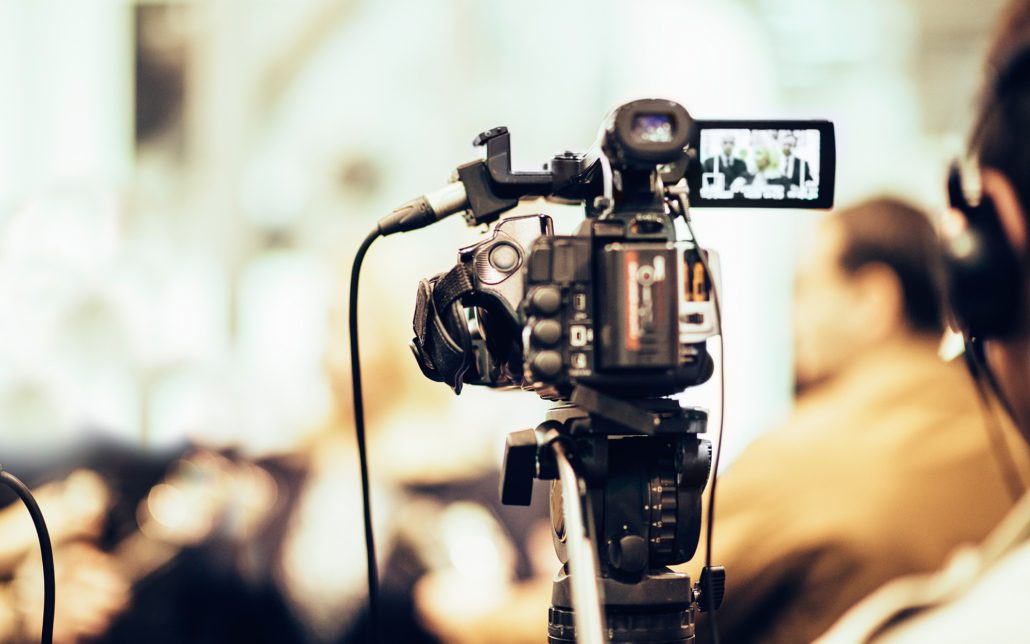 public relations team filming brand event