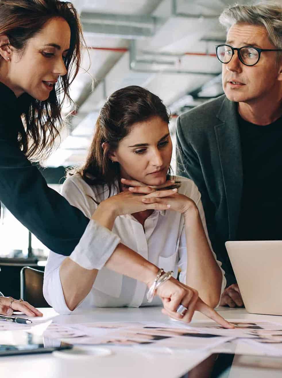 pr agency team working on event planning strategy in posh office