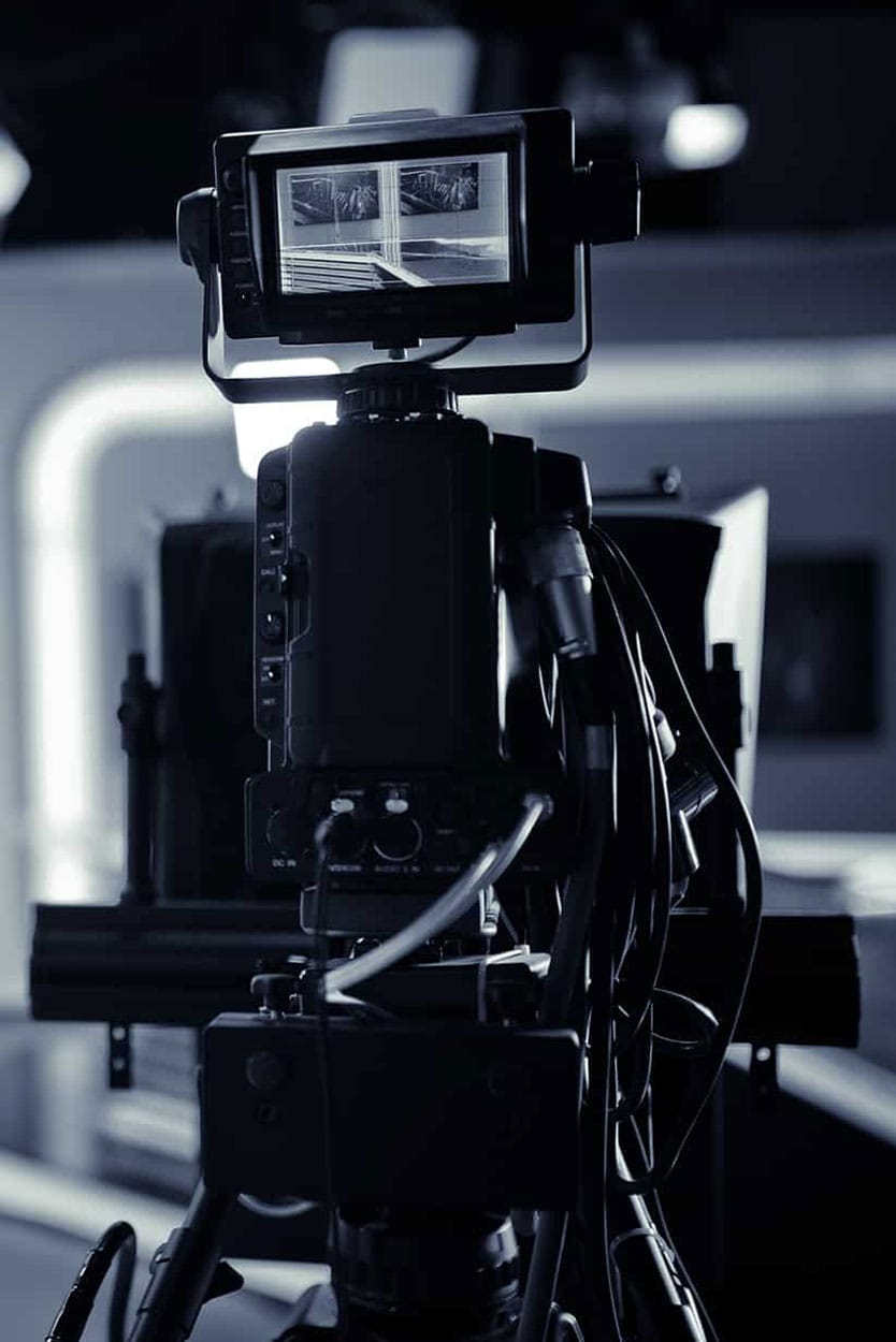 television camera in commercial studio filming brand ad