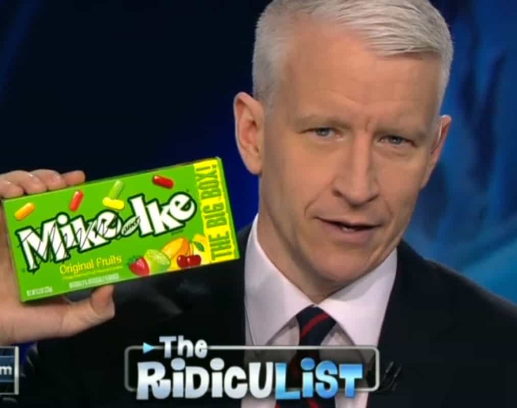 anderson cooper holding a box of mike and ike candy on CNN with 'mike' scribbled out for the 'split up' campaign