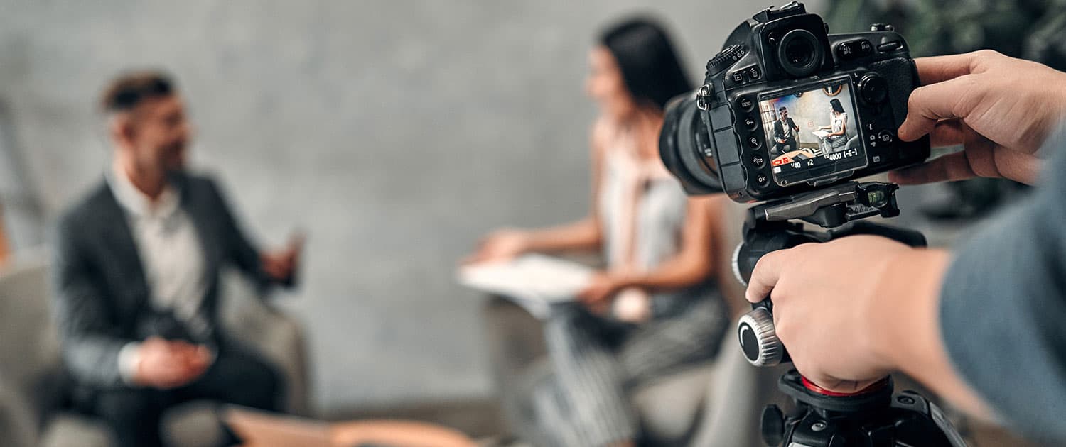 journalist interviewing brand owner while filming for pr campaign