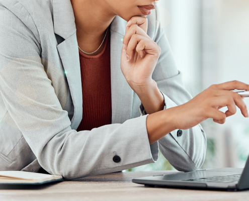 woman working on computer in pr agency office