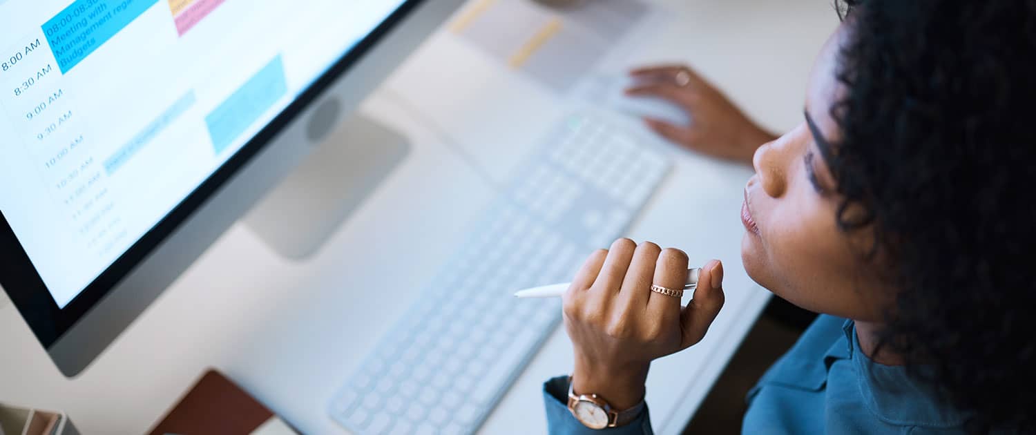 pr expert working on press release on computer in office
