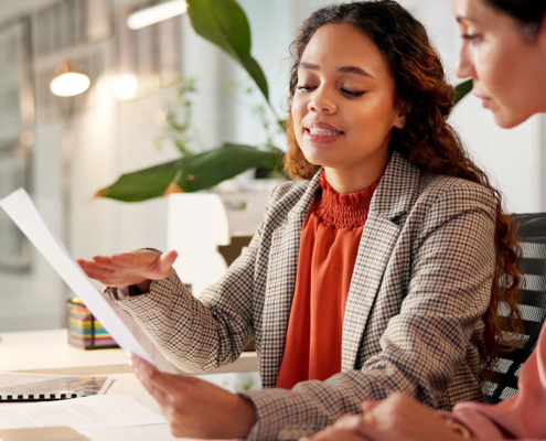 pr firm executives discussing 90-day plan in agency off